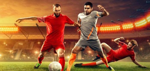 Soccer players fight for a ball. Professional soccer stadium. Sport event